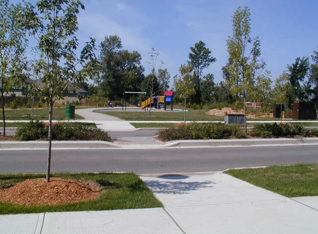 5.11.3 Pedestrian Refuge Islands Pedestrian refuge island along a residential collector road, Guelph, ON Pedestrian refuge islands are medians that are placed in the centre of the roadway separating