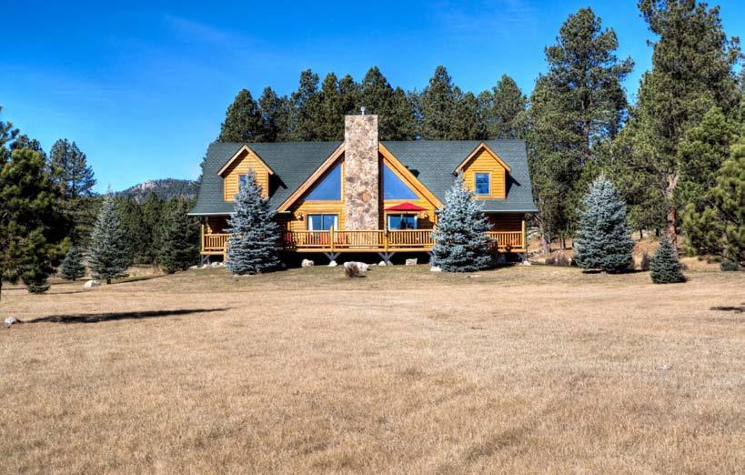 FOR SALE Highlight Features: 5,134 square foot, four bedroom, three and a half bath Cypress Log Home City water and sewer Easy access to endless recreational opportunities Only five minutes to Custer