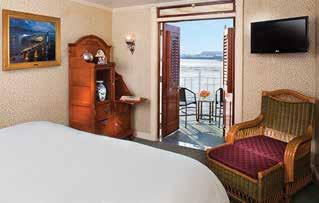 H Sitting Area H Vanity Mirror and Desk H Interior and/or Exterior Access H Promenade and Observation Decks A DELUXE OUTSIDE STATEROOMS WITH PRIVATE VERANDA With your own private veranda, these