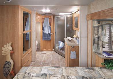 Model 355 CK 1 1 Our large 60 x 80 inch bed, oversized lavatory sink, tub/ shower surround with glass door, and
