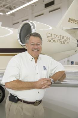 John R. Bell II Curriculum Vitae John Bell is the President and founder of JB Aviation, LLC ( JBA ) located in Wichita, Kansas. His background includes 34 years of experience in corporate aviation.