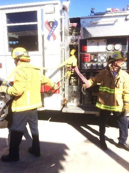ENGINE MODULE Page 8 of 23 5. Second firefighter places arm through unused loop. 6.