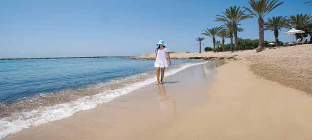 sparkling Mediterranean Sea, the Asimina Suites Hotel embraces