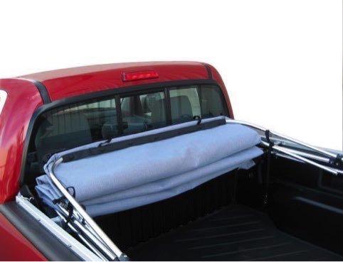 You can leave the front window secured while retracting the canopy.