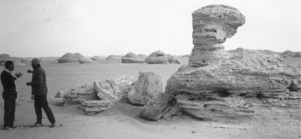 Erosional Regs or serirs (expansive stony pavements) Yardangs Yardangs in