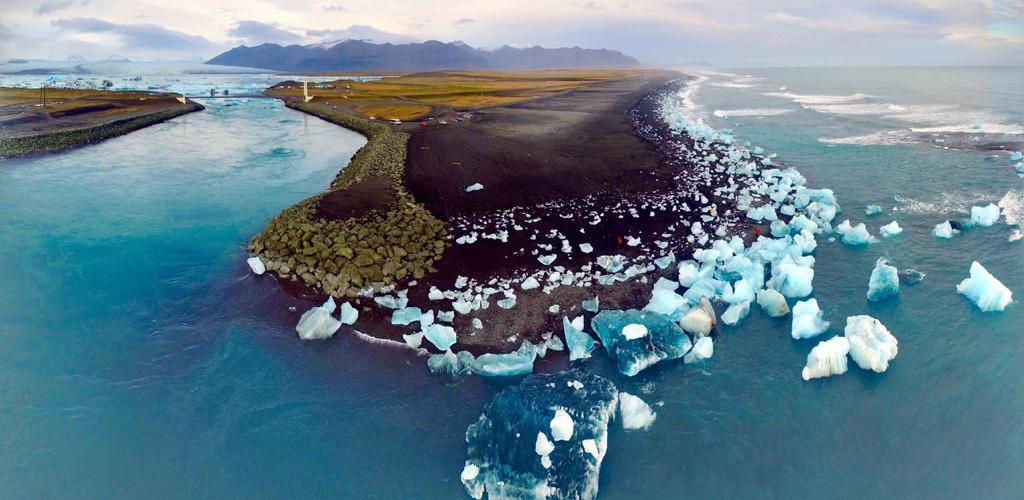 After attempting to internalize the beauty of blue ice, transfer to Jokullsarlon where you ll be taken further