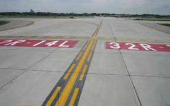 Figure 14-12. Surface painted runway holding position signs for Runway 32R-14L along with the enhanced taxiway centerline marking. Figure 14-15.
