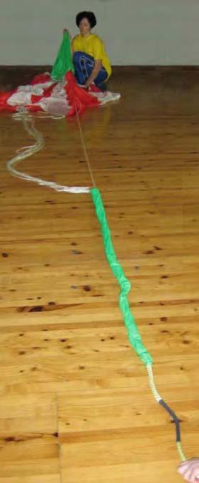 You will need two people, a long length of string and an area that is clean, 1 The stretched line in the photo is attached to the pull down apex (it is made up of three or four parallel lines