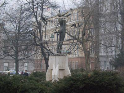 Copyright by GPSmyCity.com - Page 5 - D) Multicultural Man Placed in the Alija Izetbegovic- Trg Oslobodenja Square, the Multicultural Man represents a statue of a man who builds the world.