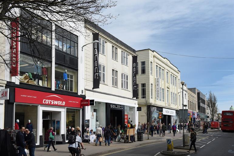 SITUATION The property occupies a prominent, corner site within the prime retailing section of Western Road diagonally opposite Churchill Square (the West Mall) and adjacent to New Look, Cotswold and