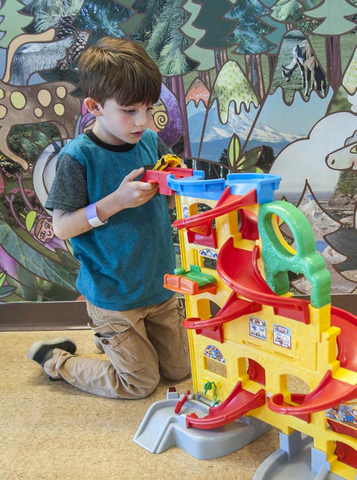 After you check in, you can go to the playroom, where you can play with toys or a video game or do a craft.