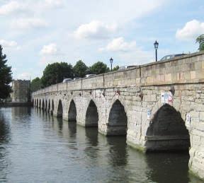 It replaced a timber bridge which was constructed around 1313 on the site of an earlier ford.