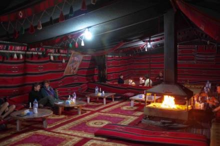 Around noon, we meet with a family for lunch to taste the local cuisine and learn a bit about their customs. After lunch, we depart for Wadi Rum in southern Jordan.
