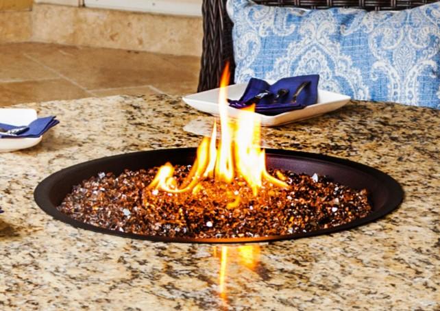 scuff the burner pan in any way. The 12 304 stainless steel Penta burner & 24 Linear burner helps with optimizing the tables flame control as well as ensuring a consistent symmetrical flame.