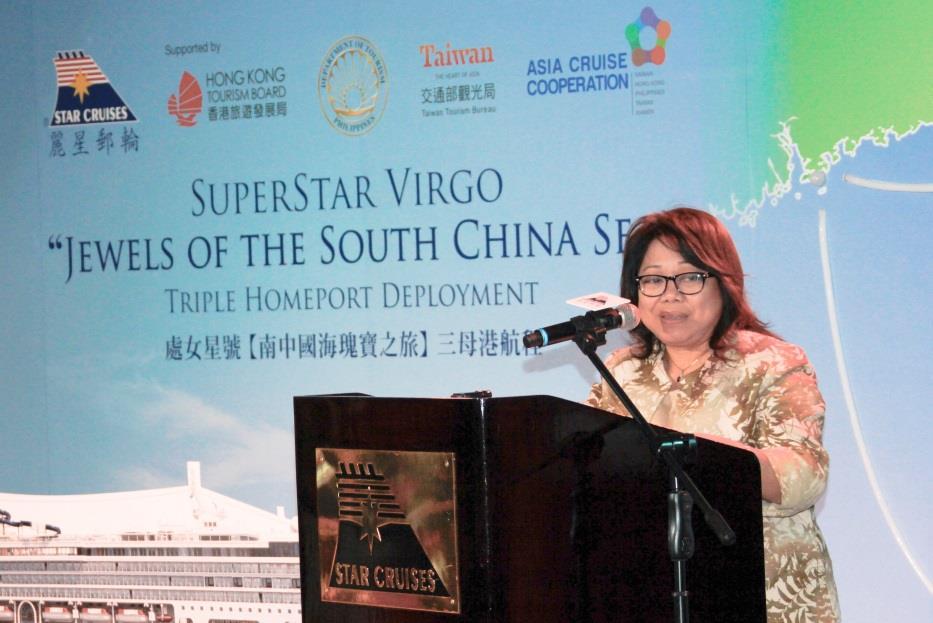 The Honourable Ms. Maria Corazon Jorda-Apo, Director Market Development Group, Philippine Department of Tourism giving a speech.