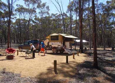 and tents. The basic facilities include a camp kitchen and open fire barbecue rings with some wood provided.