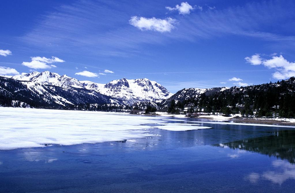 The east side of June Lake, which has a beach, is a great place to relax in the summertime. The shallow water is warm enough to make your feet wet or even swim.