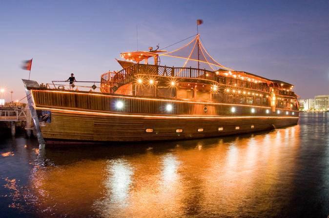 (Dhow Cruise with dinner) - 4 stars catering Enjoy a romantic dinner aboard a traditional Arabic Show that glides silently along the creek of Dubai under a starry and moonlit sky.