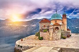 The Gulf of Kotor (Boka Kotorska) cuts deeply into the coastline of the southern part of the Yugoslav Adriatic, creating four spectacular bays ringed in mountains, the fjords of the Mediterranean.