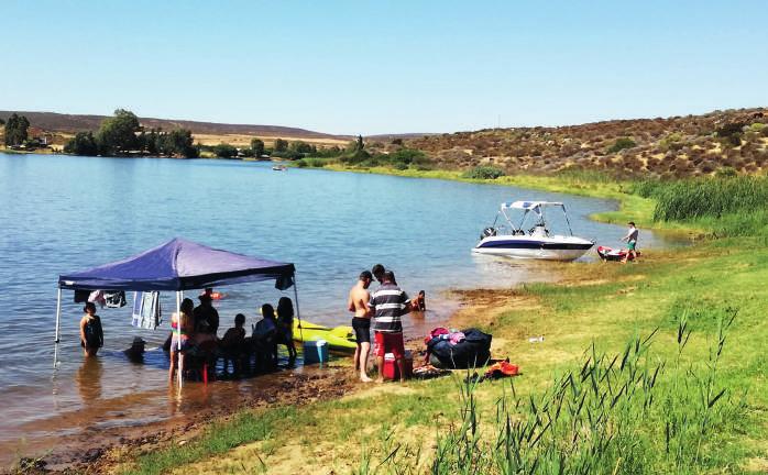 time spending sunny days on the grassy bank of the Bulshoek Dam, just metres away from the camping sites hiking trail on the private nature reserve in the Cederberg Mountains.