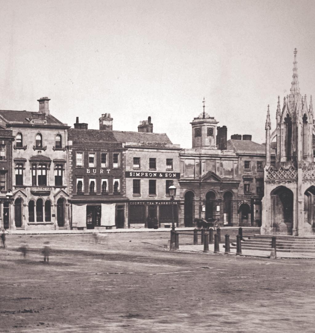 This view of the market place in Devizes c1880 shows the shop of Burt s the ironmongers.