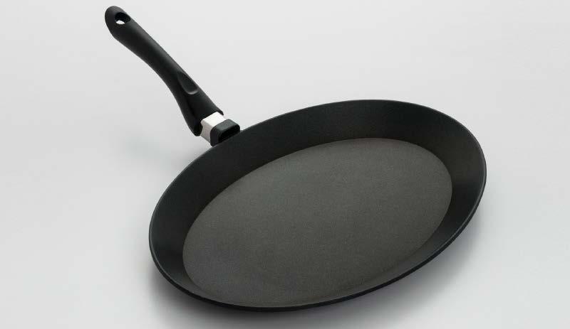 This frypan has a Bakelite handle and a generous cooking area of 15.75" x 11". Induction ready.
