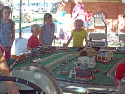 THE MAIN LINE Peter Atonna, Editor 25375 N. Feather Mountain Rd. Paulden, AZ 86334 Toy Trains and Kids - A great combination.