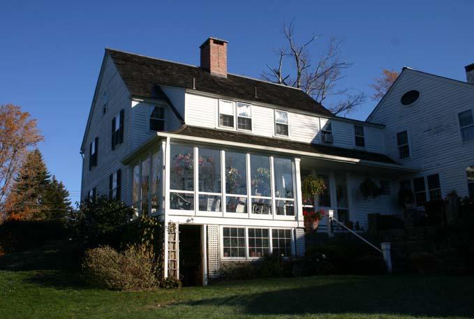 In the 1930 s a dormer and sun porch was added to the back of the main house.