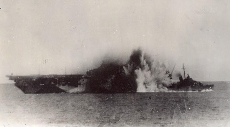 on a Sunday afternoon one of our own planes - returning from a bombing run - exploded on the deck under his gun station, killing 56 of our own crew.