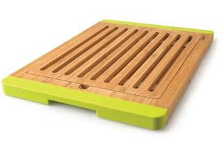 6 cm (13 x 13 x 3/4 ) Material: bamboo and silicone - Silicone colour: lime green square bamboo chopping board 1101682 25 x 25 x 1.