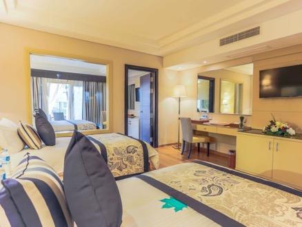 FAMILY ROOMS Area Specifications Family room Two connected bedrooms with one king size bed and two twin beds with interconnected door, mini bar (water, soft drinks and beer refilled daily free of