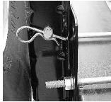 1 Cotter key CHANGING THE TIRE Never raise the RV by placing the jack under the axle, springs or any attachment parts. Failure to comply could result in property damage, personal injury or death. 1.