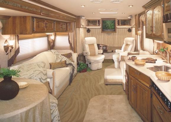 EXCURSION 38 U EXOTIC NATURE Exotic interiors fit for a king. Giraffe, zebra and leopard patterned fabrics and carpeting leave little doubt where you are headed in this interior.