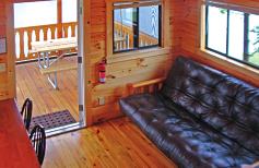 Each Cabin can sleep up to 6 people (limit of 4 adults) with bedding for 4 and 2 in the loft area (sleeping bags and air mattresses recommended). The private room under the loft has a queen bed.