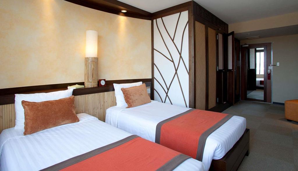 DELUXE ROOM A spacious Deluxe Room offering generous comfort in an elegant