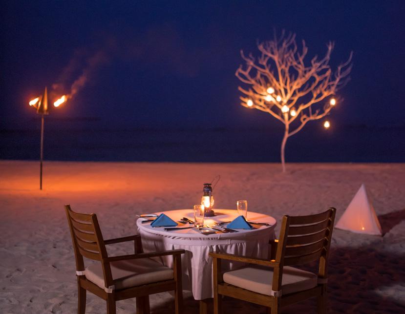 DINNER UNDER THE STARS Relax under the Maldivian night sky and indulge in a splendid five-course dining experience for two, on your own