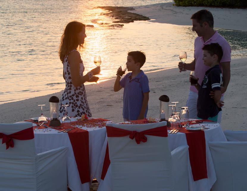 PRIVATE ISLAND SUNSET With a glass of sparkling wine in hand, enjoy the beauty of a romantic Maldivian sunset from the privacy of a