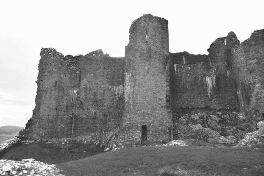 2 Answer all questions in the spaces provided. 1 Study Figure 1. Figure 1 is a photograph of Carreg Cennen in Wales.