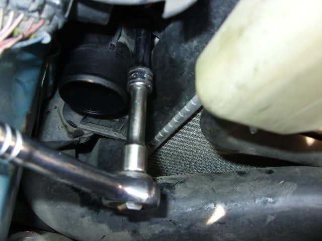Insert 8mm fixing bolt tighten it up,photo 14 Then with the jubilee clip facing the right way up