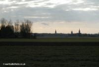 The spires of Ypres viewed from near Frezneburg, a little beyond the front line of 6th of June