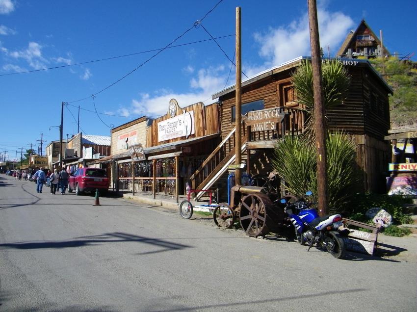 Route 66 passes through Oatman, Arizona. The Oatman brochure I have refers to it as an authentic western ghost town and mining camp.