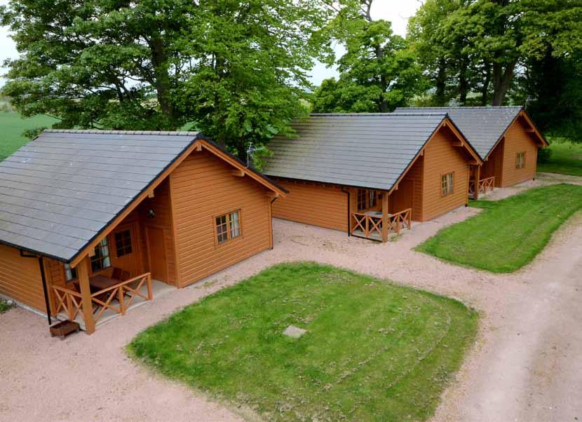 > FOR SALE < Holiday Lodge COMPLEX and owners house WOODLAND HOLIDAY LODGES, Kincaple, NR St Andrews, Fife, KY16 9SH > 15 high quality holiday lodges/cottages > Attractive 5