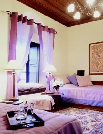 Room Vachos Village view First floor Elegant country decoration Two single beds Bathrobes Bath slippers APIVITA natural products (Organic cosmetics) Hair dryer Free Wi Fi Minibar Cable TV Central