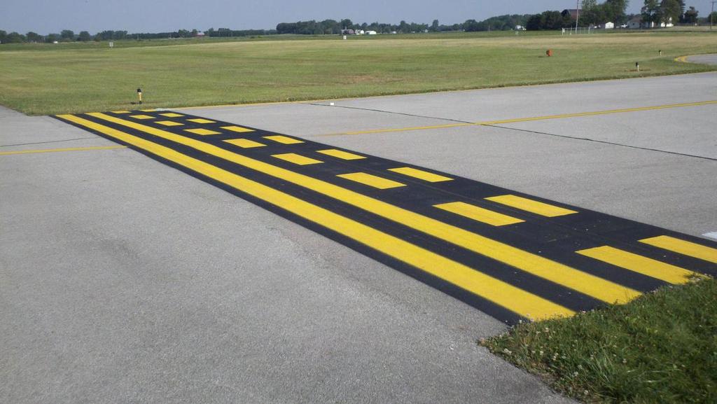 Taxiway location signs with yellow letters and black backgrounds indicate the taxiway on which you are located.