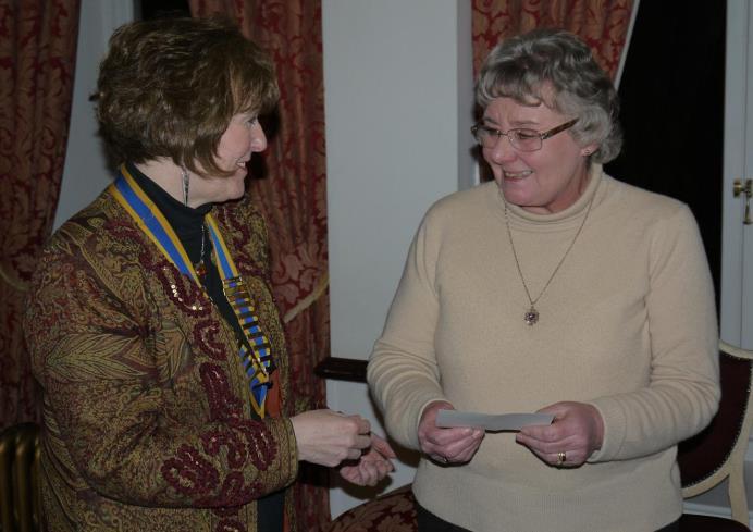 President Helen makes the presentation to Sheila Ramsay of Starter Packs, Perth Starter Packs is an organisation based in a unit off the Shore Road in Perth, staffed