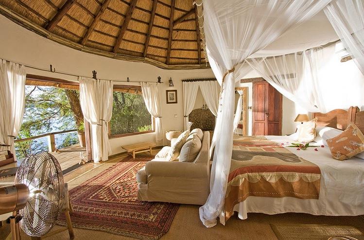 Page 12 Tongabezi is idyllically situated on the banks of the Zambezi River 10 miles upstream from Victoria Falls.