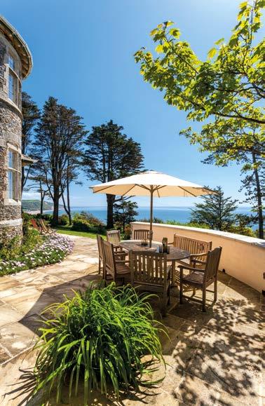 Upcott Old Beer Road, Seaton, Beer, Devon EX12 2PX A most attractive Arts & Crafts house with additional self-catering Lodge in a superb waterside position with far-reaching views of the Jurassic