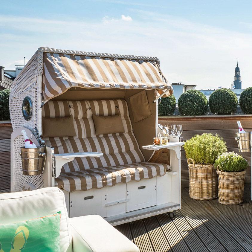 ABOVE THE ROOFTOPS OF HAMBURG Discover a unique mix of Hanseatic flair and lifestyle remi niscent of the Hamptons