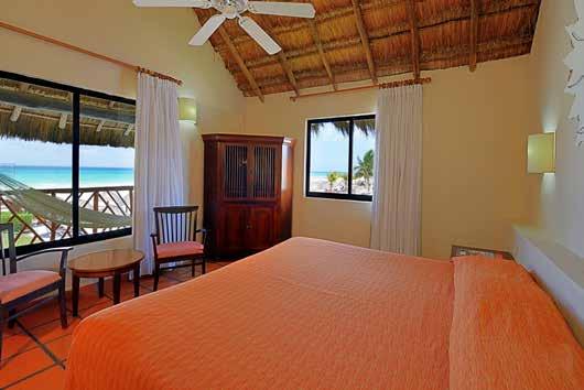 RIVIERA MAYA MEXICO All-Inclusive Resort. 286 rooms and suites grouped into brightly colored villas with thatched roofs and private balconies and terraces.