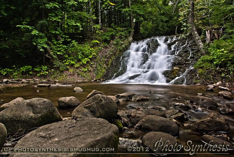 Morgan Falls Morgan Falls is an unexpected gem at the conflux of the Morgan Creek and the Carp River. They are located off County Road 553 when traveling from Marquette towards Marquette Mountain.